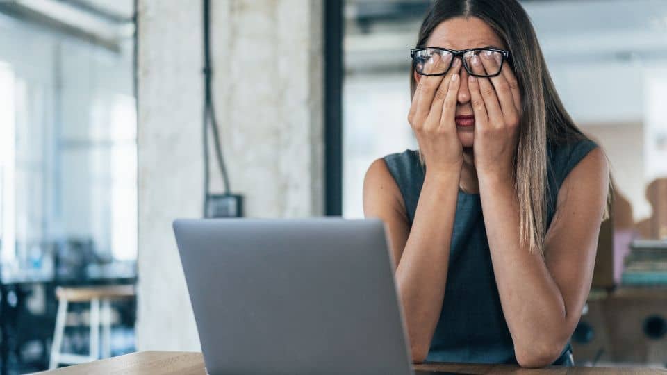 woman overworked tired and stressed out