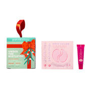 Patchology skincare products including a box labeled 'Under the Mistletoe', a pink packet, and a tube on a white background.