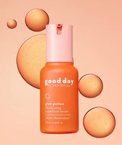glow potion brightening serum on a bright orange background