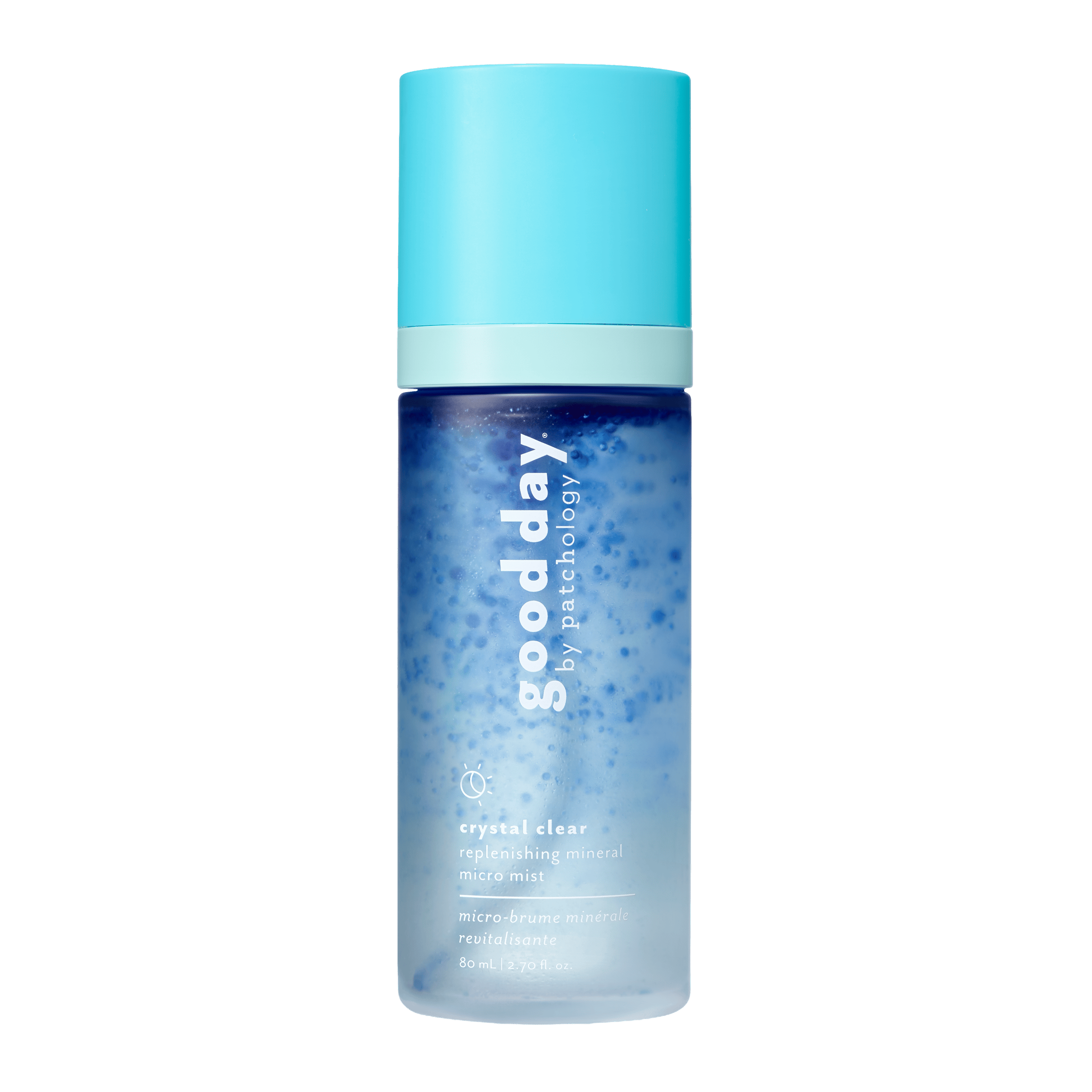 A bottle of Good Day Crystal Clear Refreshing Mineral Micra Mist, featuring a light blue cap and a blue-to-clear gradient bottle, centered on a solid green background.
