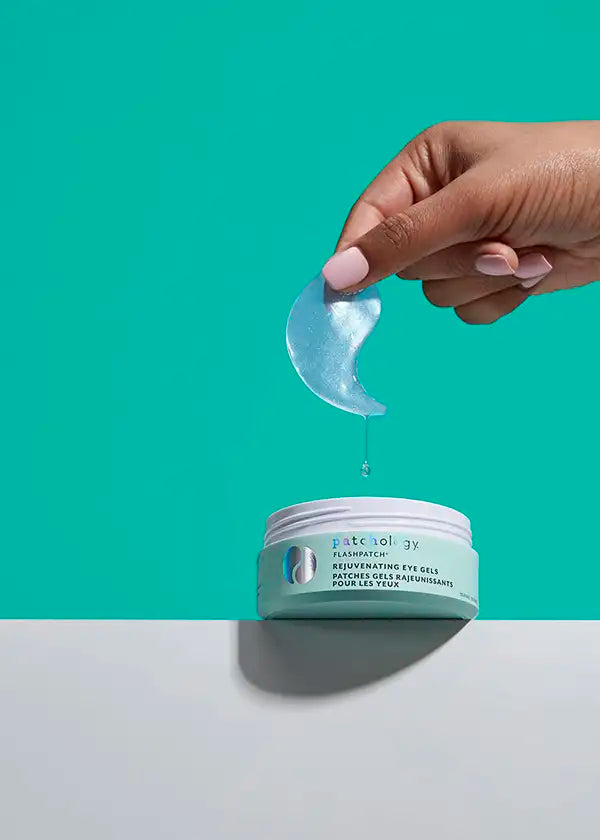 hands close up detail moisturizing rejuvenating under eye patches by patchology 