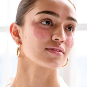 woman wearing firming hydrating rose eye masks pre-makeup eye patches