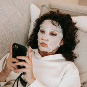 woman wearing hydrate sheet masks nourishing smoothing skincare