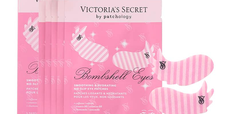 Victoria's Secret by patchology Bombshell Eyes smoothing and hydrating eye patches, shown in pink striped packaging with two matching patches displayed in front on a white background.