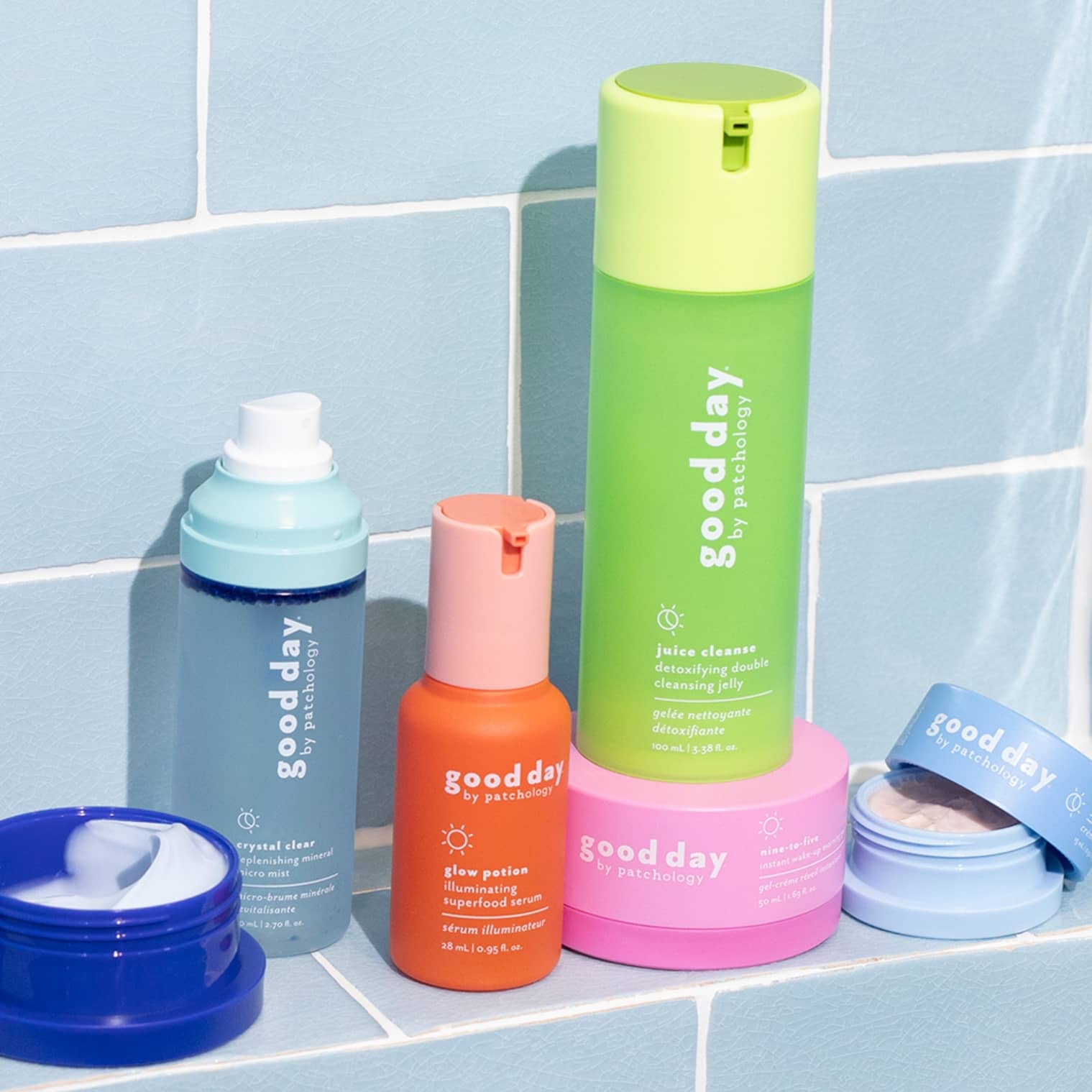 good day cleansing Brighting molecular sunshine skincare on blue tile