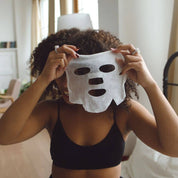woman wearing get dewy with is sheet mask