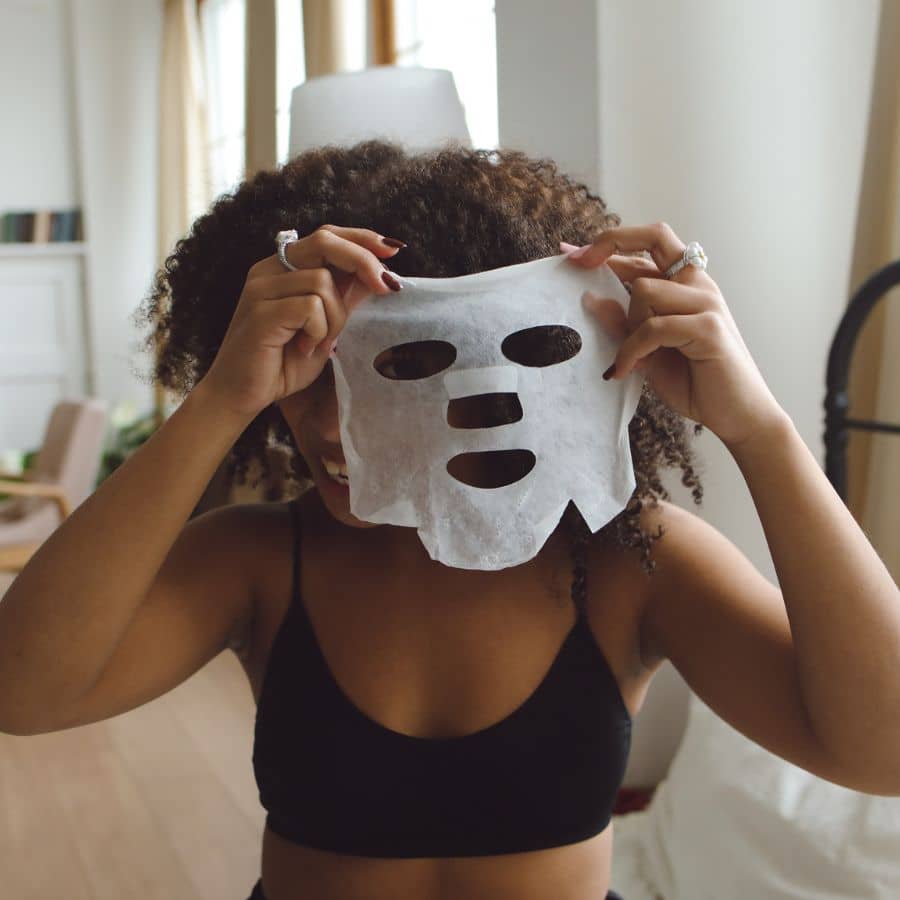 woman wearing get dewy with is sheet mask