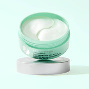 Jar of Patagonia Flashpatch Rejuvenating Eye Gels on a light green background