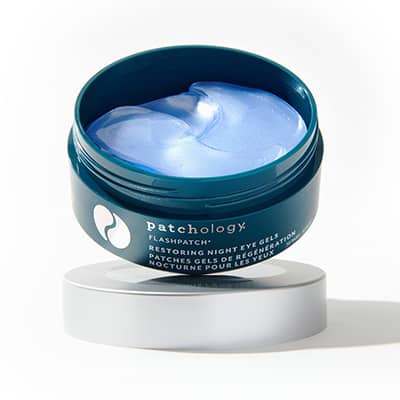 patchology restoring night retinol eye patches in a jar on a white background