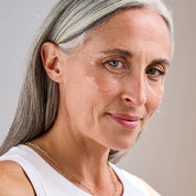 woman wearing undereye mask smooth fine lines and target puffiness