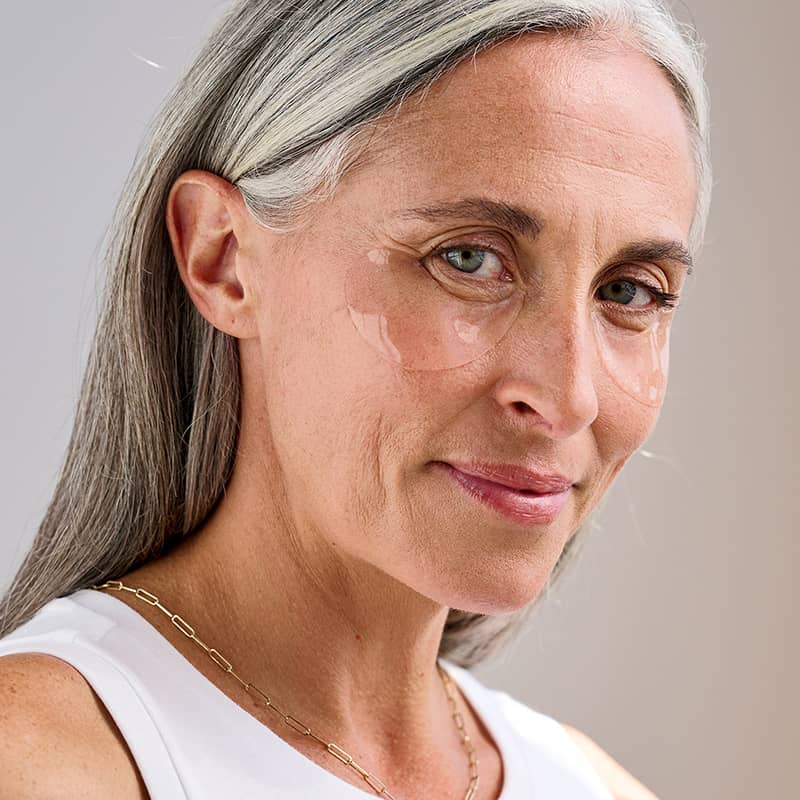 woman wearing undereye mask smooth fine lines and target puffiness