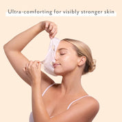 woman wearing sheet mask ultra-comforting for visibly stronger skin sensitive skincare
